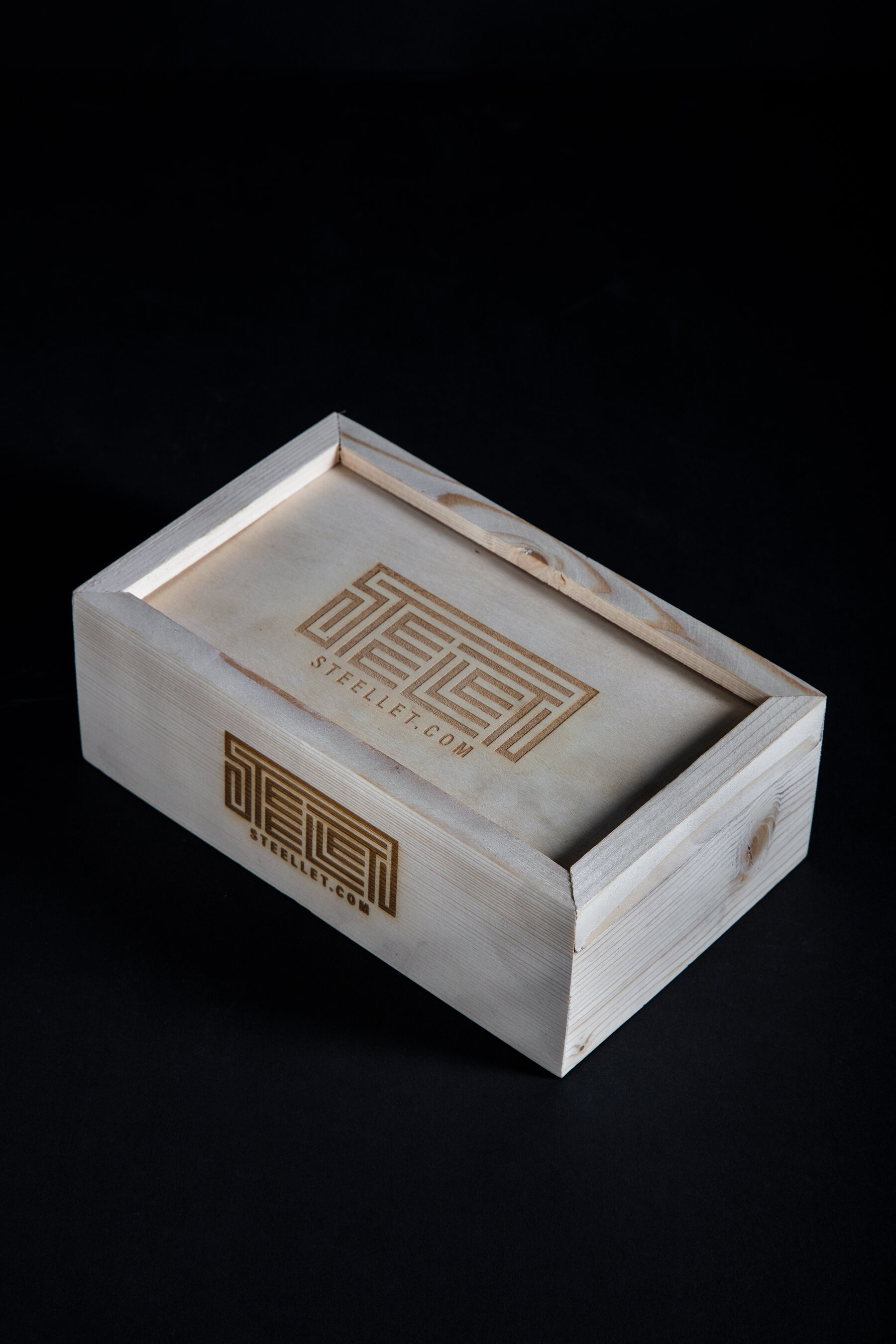 Closed Steellet box against a dark background
