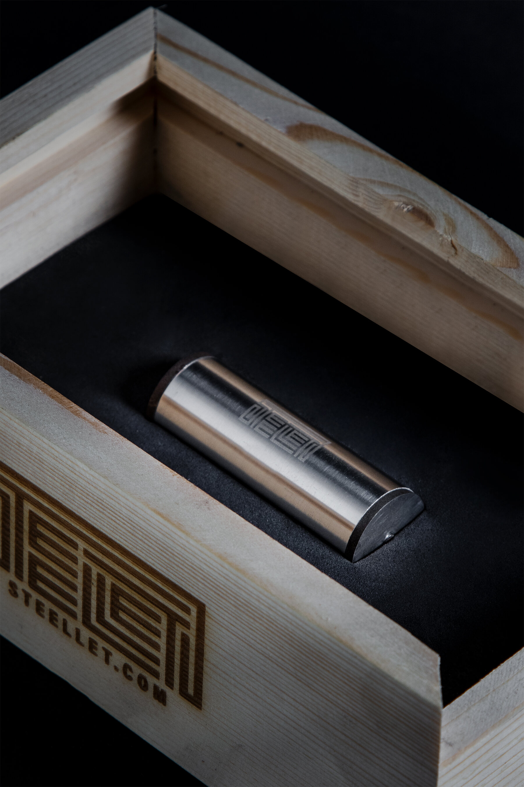 Steellet in a wooden box against a dark background